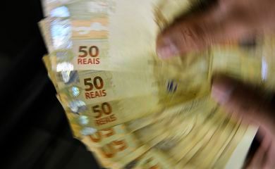 Caixa paga novo Bolsa Família a beneficiários com NIS de final 4